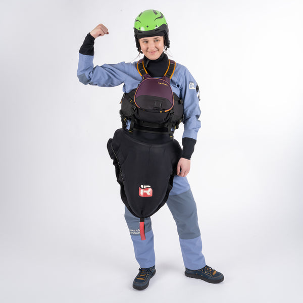 Person wearing Immersion Research Sahalie Dry Suit in Wisteria in full kayaking gear