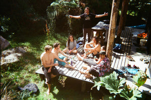 group of paddlers hanging in the sunshine in chile