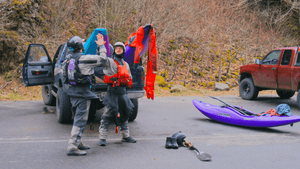 Two people preparing for kayaking in Lunar Dust 7Figure