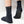 Black neoprene socks with grip on bottom of foot with brand logo on ankle on a white background