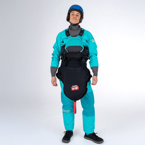 Woman in Immersion Research Women's Sahalie Dry Suit Peacock Blue  with full kayak gear