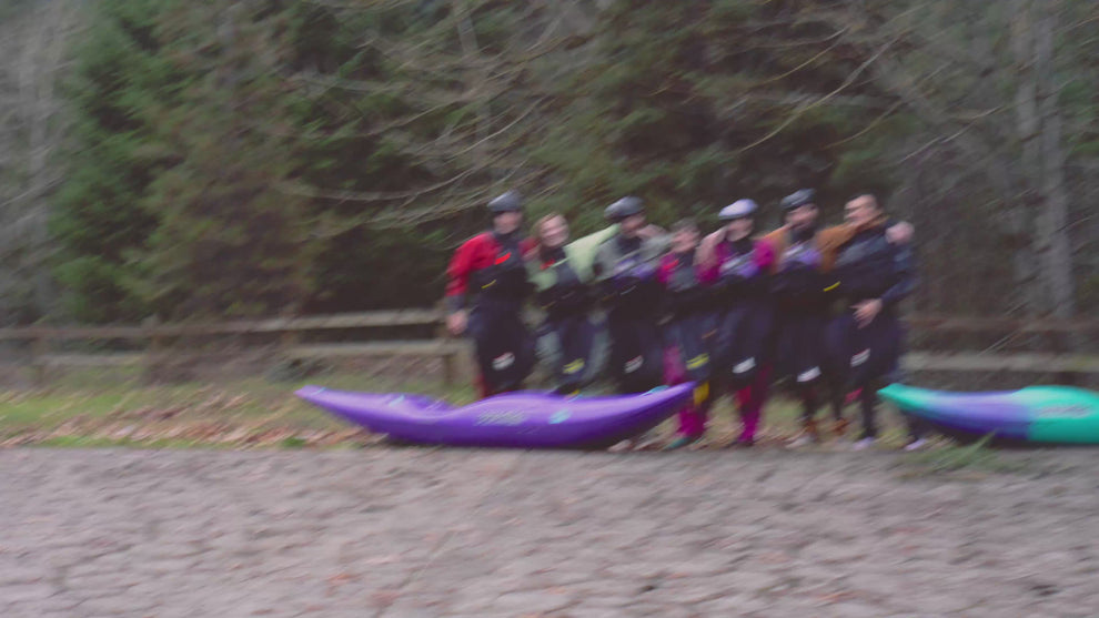 Video of kayakers paddling whitewater